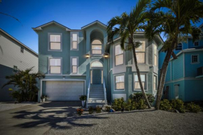 Estero Bay Sunrise by Sun Palace Vacations